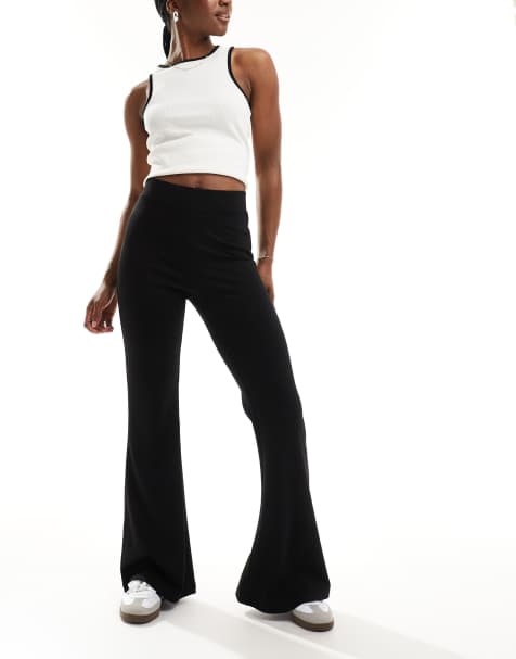 Monki jersey flare leg trousers in black