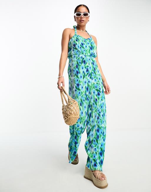 Monki jersey plisse cross back detail jumpsuit in blue and green flower  print