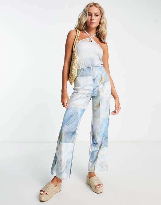 Monki - Jumpsuit met halternek en tie-dye in blauw