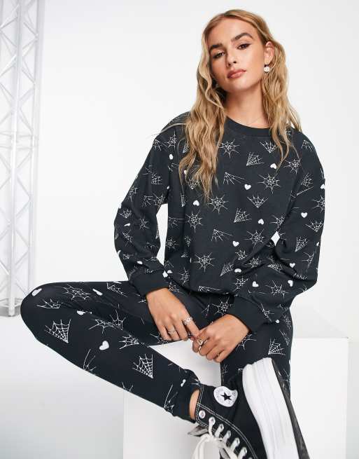 Monki - Katoenen sweatshirt met spinnenweb motief in zwart 