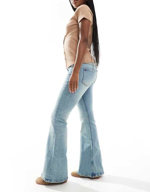 Monki Katsumi low rise flared leg jeans in tinted dirty wash