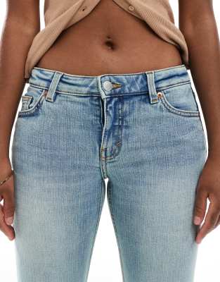 Monki Katsumi low rise flared leg jeans in tinted dirty wash