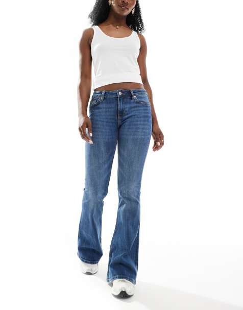 Monki Katsumi low rise flared leg jeans in blue fade wash 