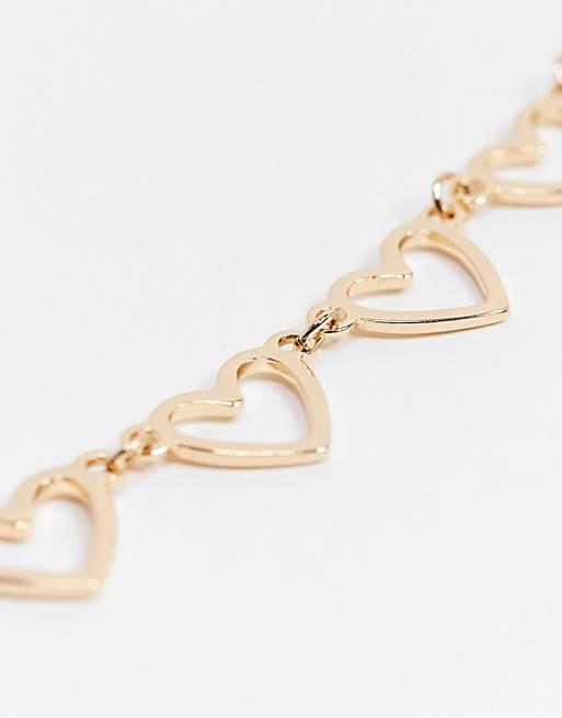 ufravigelige Utallige Pointer Monki - Kira - Halskæde med hjerte i guld | ASOS