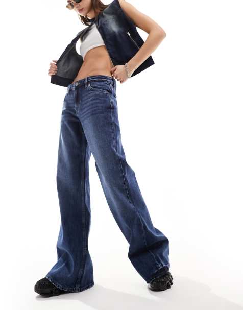 Monki - Kiri - Jeans ampi a zampa a vita bassa lavaggio blu scuro - view 1