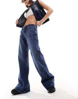 Monki Kiri Low Rise Loose Fit Flared Jeans In Dark Blue Wash