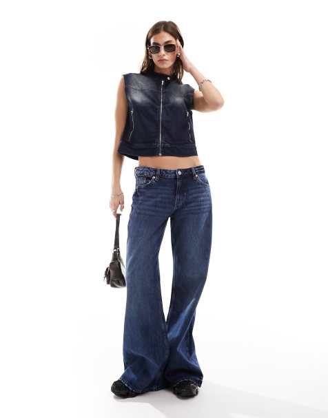 Monki – Kiri – Mörkblå utsvängda jeans med tvättad finish, låg midja och ledig passform - view 1