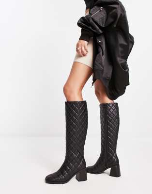 knee high quilted heeled boot in black