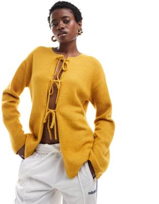 knit bow tie up cardigan in yellow melange