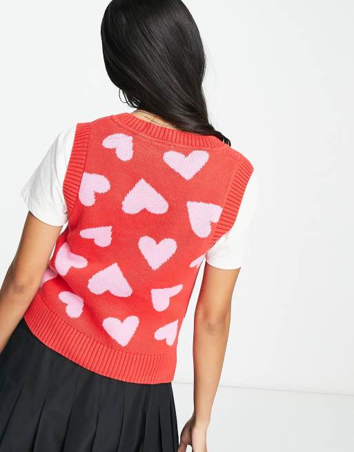 Monki knitted sweater vest in red with pink hearts | ASOS