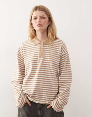 Monki - Langärmliges Oversize-Rugby-Polohemd mit Streifen in Beige und Weiß