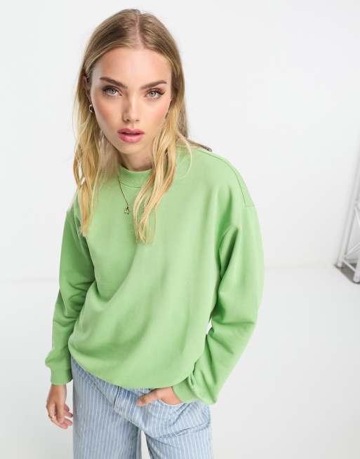 Monki – Langärmliges Sweatshirt in Grün mit Rundhalsausschnitt