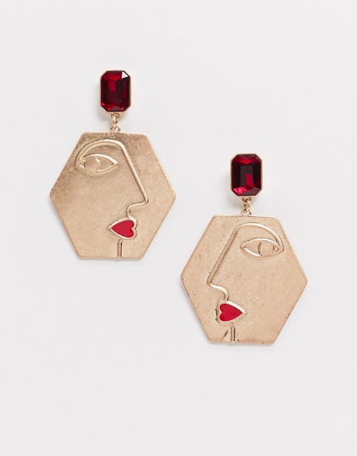 Monki diamonte face drop earring in gold and red