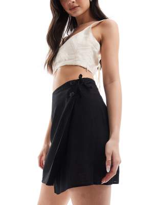 linen mix wrap tie detail mini skirt in black