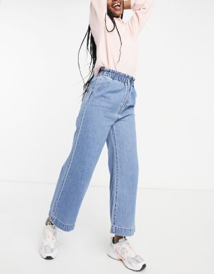 Monki Lizette recycled wide leg jeans with paperbag waist in mid wash blue  | ASOS