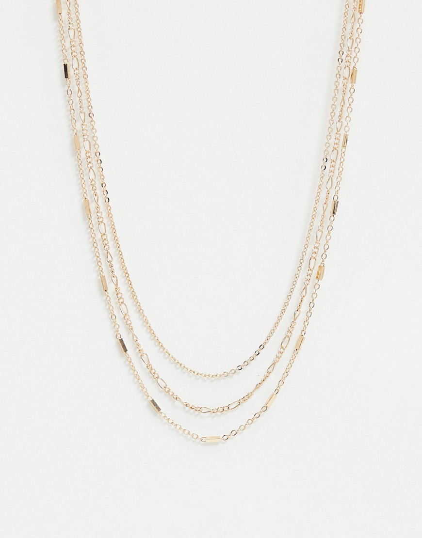 Monki – Lollo – Guldfärgat halsband i flera rader