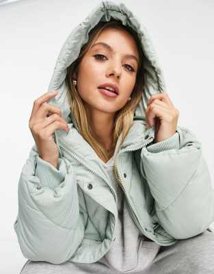 monki long puffer coat green