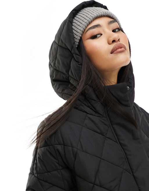 Monki long quilted coat in black | ASOS