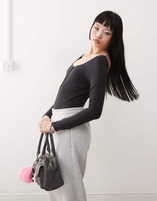 Monki Long Sleeve Bodysuit With Button Detail In Black