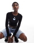 [Monki] Monki long sleeve cropped top in black with butterfly front print M BLACK