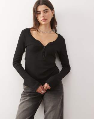 Monki Monki long sleeve henley button top with flared sleeves in black