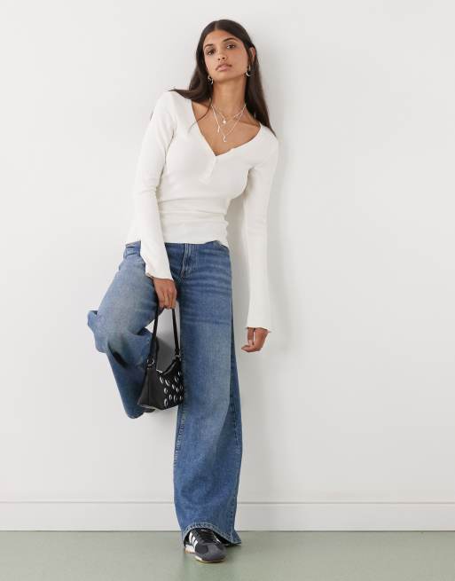 Monki long sleeve Henley button top with flared sleeves in off-white