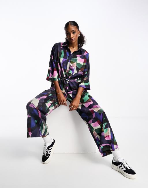 Monki long sleeve jumpsuit with collar in abstract print