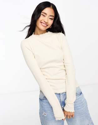 monki long sleeve lettuce edge high neck top in beige