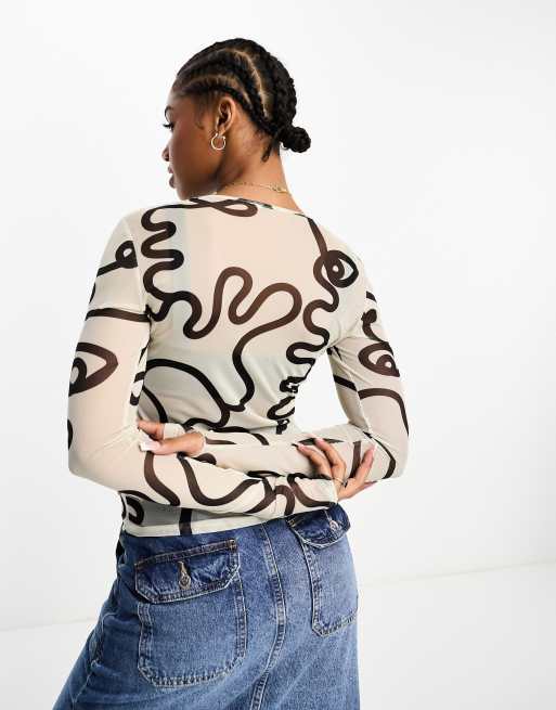 ASOS DESIGN Smiley Collab long sleeve mesh top license graphic in all over  print