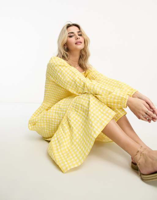 Monki long sleeve midi dress with ruffled hem in yellow gingham