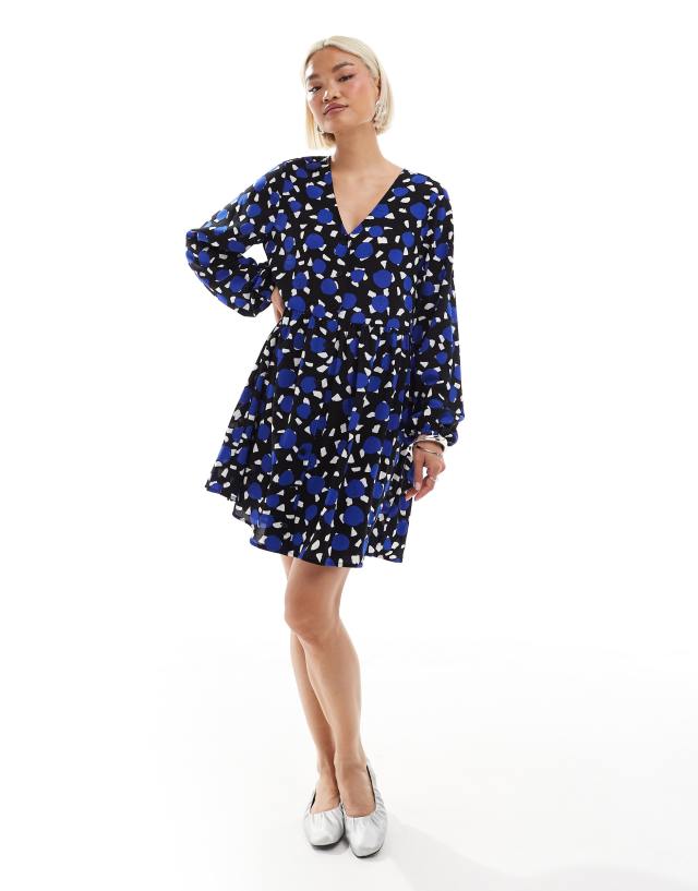 Monki - long sleeve mini dress in blue and black multi print