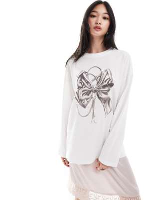 Monki Long Sleeve Relaxed Fit Top With Bow Print In White