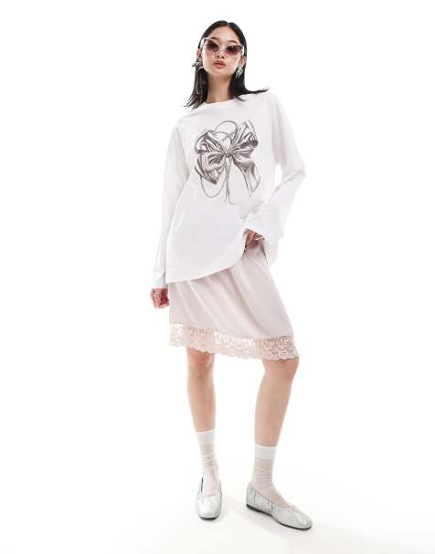 Monki long sleeve relaxed fit top with bow print in white - view 1