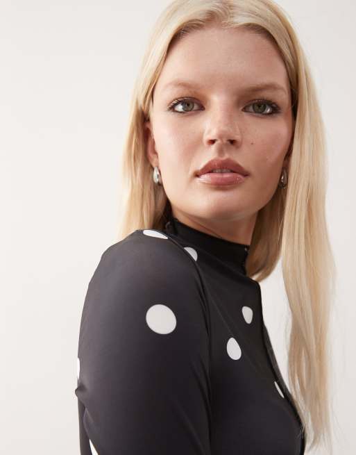 Monki long sleeve sheer T-shirt with front seam detail in black polka dot