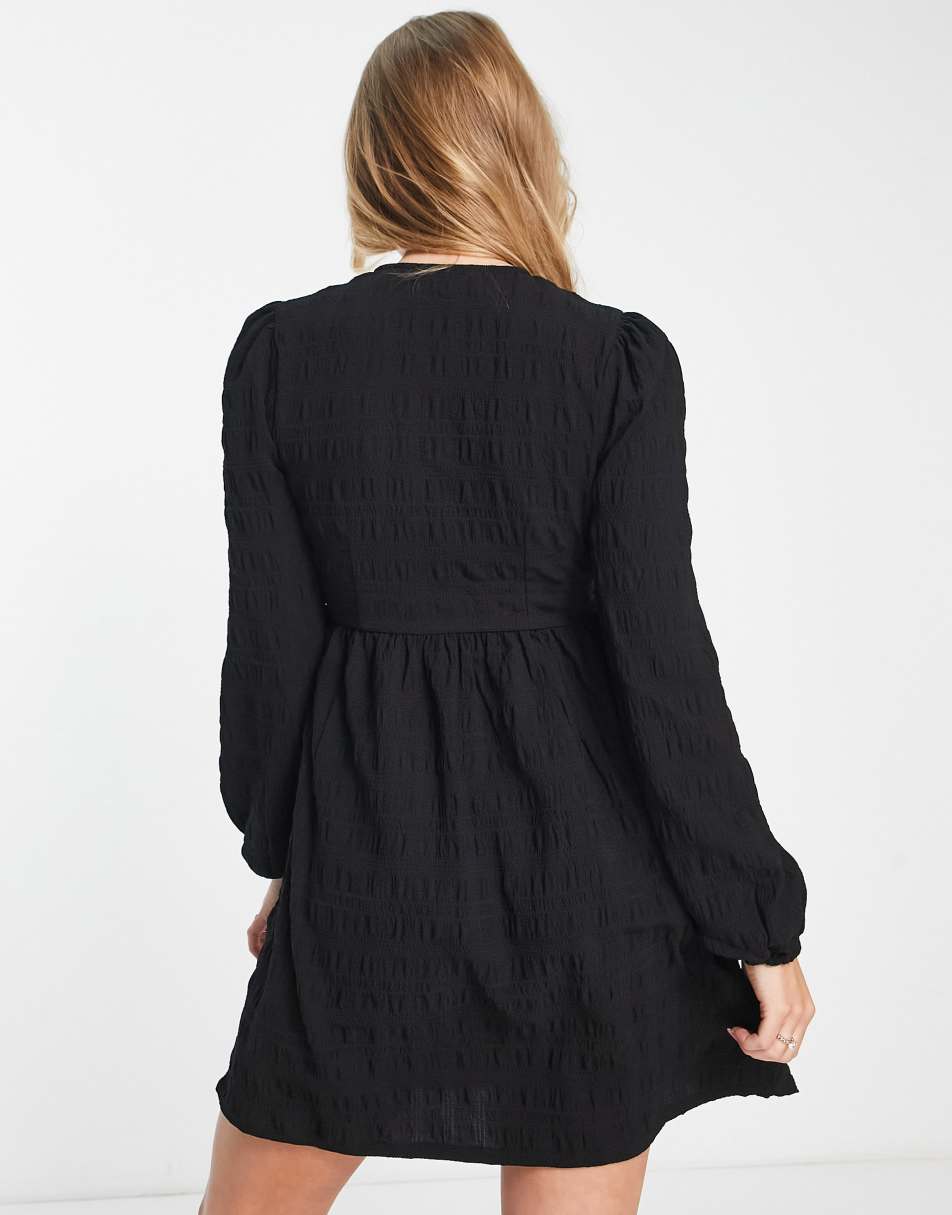 Monki long sleeve wrap mini dress in black