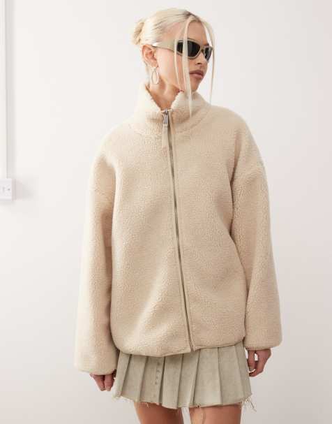 Monki long sleeve zip through fleece with contrasting trims in off white with pink floral lining - view 1