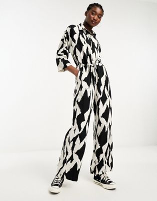 Monki loose fit jumpsuit in white and black abstract print
