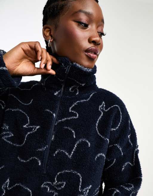 Monki loose fit sweater in navy bird print ASOS