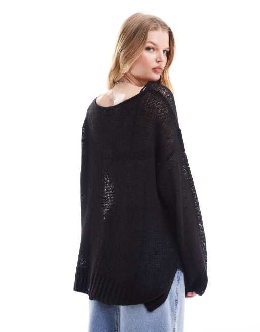 Monki loose textured knitted sweater with sheer panel in black | ASOS