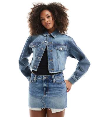 monki low waist denim mini skirt in mid blue wash