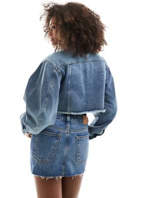 monki low waist denim mini skirt in mid blue wash