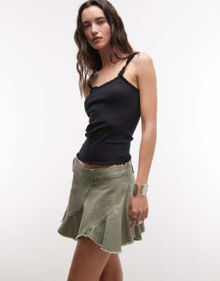 Monki Low Waist Mini Skirt With Circle Cut Details In Green