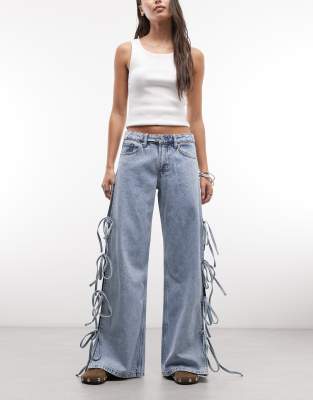 Monki Low Waist Wide Leg Jeans With Side Tie Bow Detailing In Blue