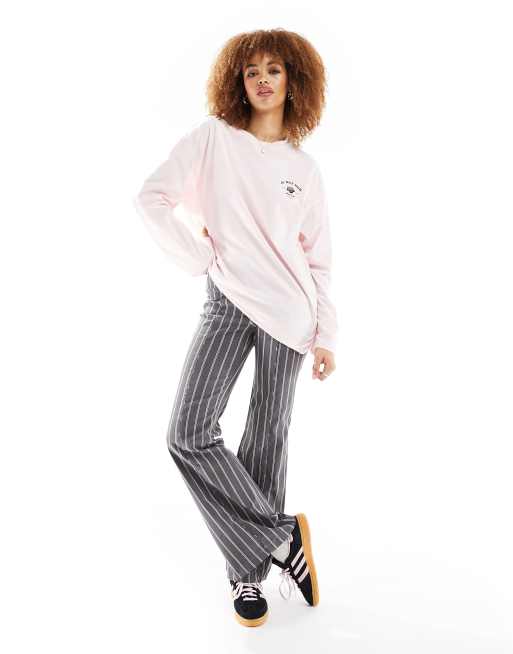 Monki - Maglietta a maniche lunghe oversize rosa con stampa 