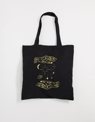 Monki Maja organic cotton halloween print tote bag in black | ASOS