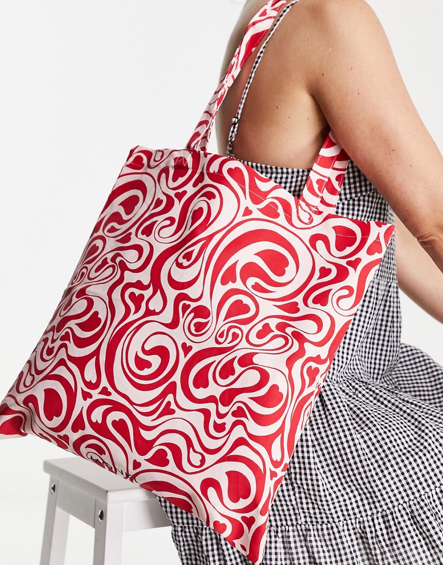 Monki - Maxi borsa in cotone organico rosso e rosa con stampa astratta