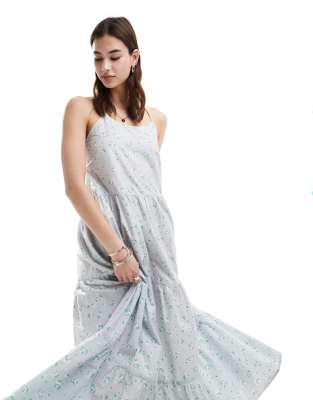 monki maxi sun dress with tiered layers and strappy low back in blue scattered ditsy flower print