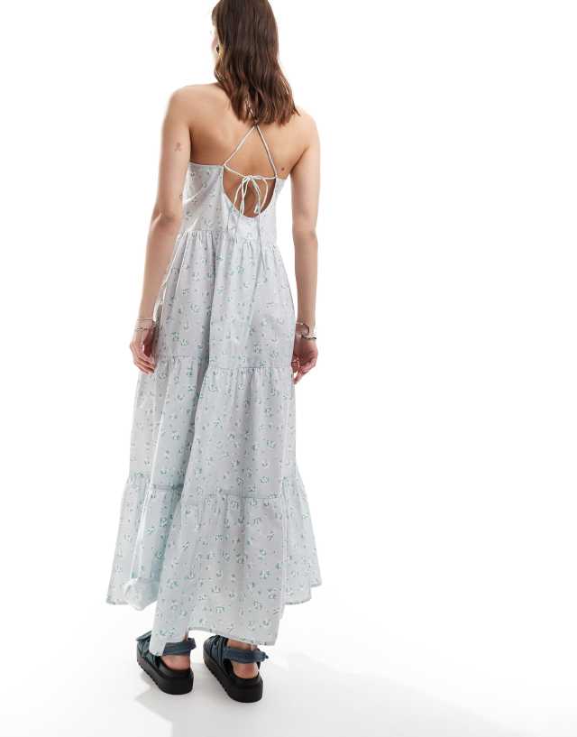 Monki - maxi sun dress with tiered layers and strappy low back in blue scattered ditsy flower print