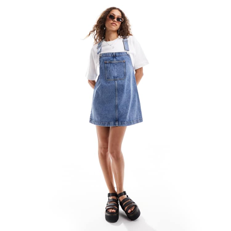 Monki mini denim overall dress in midwash blue | ASOS