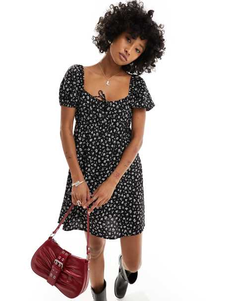 Monki mini dress with puff sleeves and ruche back detail in black - view 1